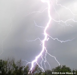 Daylight cloudy gray sky lightning strike--astalk of lightning Image Capture video frame EMJ