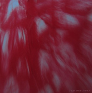 Photodigital A Figure lamenting over a scene of figures-red acrylic. Discovered Art Camera Motion Image Capture E M J
